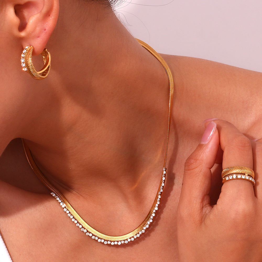 Smara Herringbone cross-stitched earrings