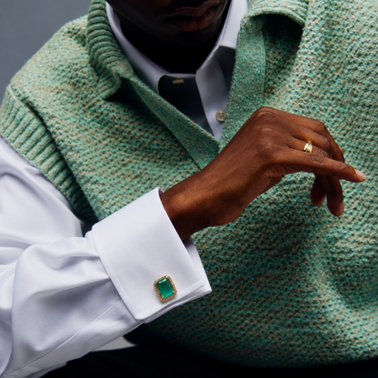 Lighter Green button cover cufflink styled on a white shirt with green knitwear